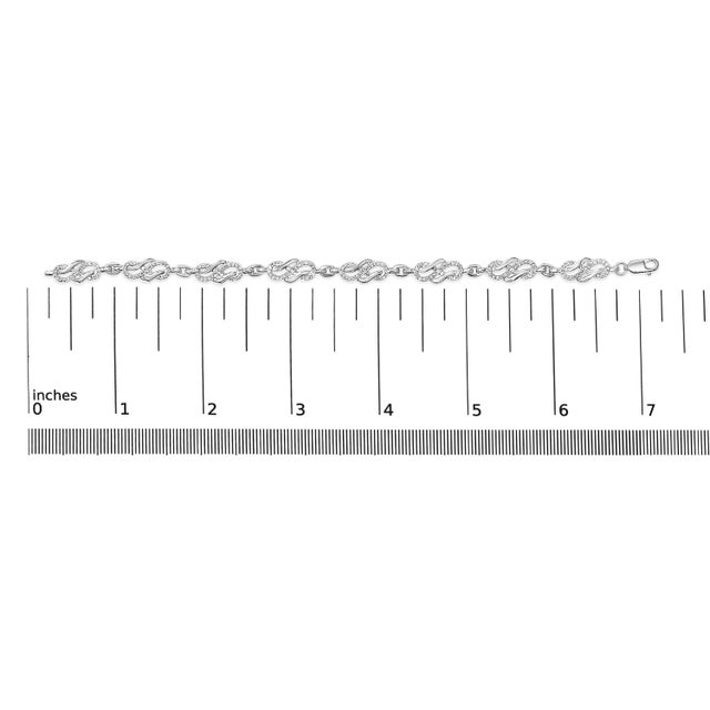 Early 21st Century .925 Sterling Silver 1.0 Cttw Diamond Infinity Loop and Swirl Link Bracelet (I-J Color, I2-I3 Clarity) - 7.25" Inches For Sale - Image 5 of 5