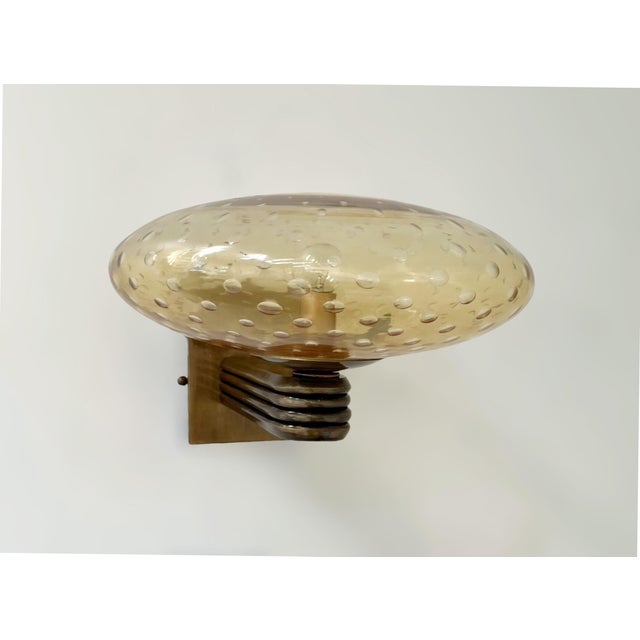Italian Art Deco style wall light with amber Murano glass shade hand blown with bubbles inside the glass using Bollicine...