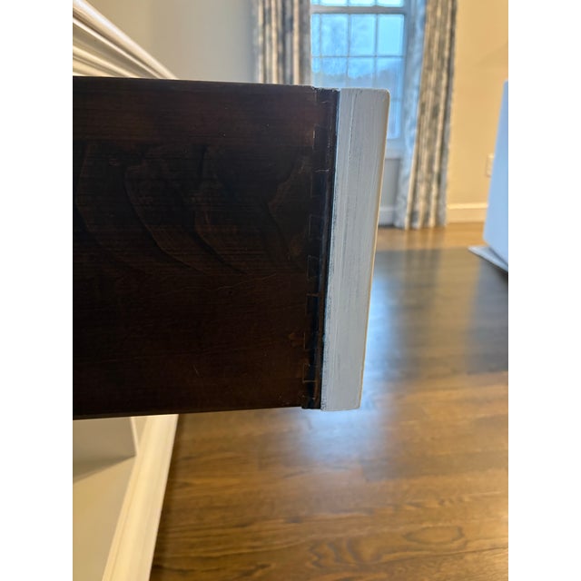 Authentic Romweber credenza, known for exceptional craftsmanship and solid wood construction. This piece features three...