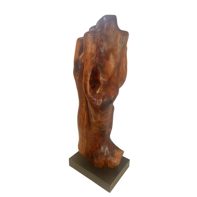 Incredible Minimalist sculpture hand carved from a single piece of reclaimed mahogany wood with beautiful patina. The...