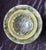 An exquisite set of three 20th-century Chinese nesting bowls, masterfully hand-carved from natural serpentine stone. These...
