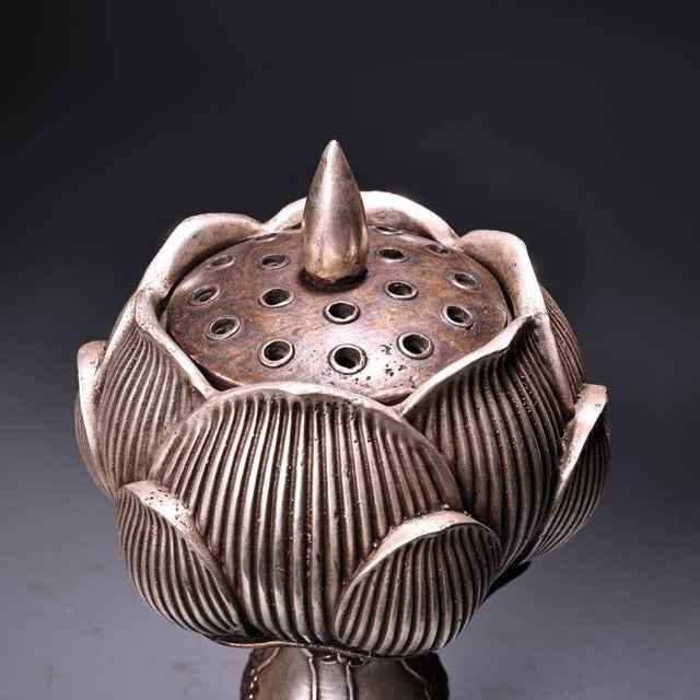 Elegant stemmed incense burner sculpted in the form of a fully bloomed lotus flower. The lotus bloom lid features fine...