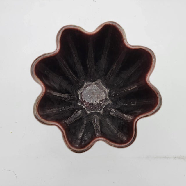 I have not been able to find this shape or glaze to nail down what Royal Haeger called it, but it is extremely cool and...