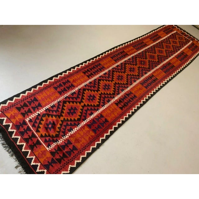 Afghan kilim Runner 384x94 cm beautifully woven Afghan kilim runner from Maiman a region. Deep rich colours and excellent...