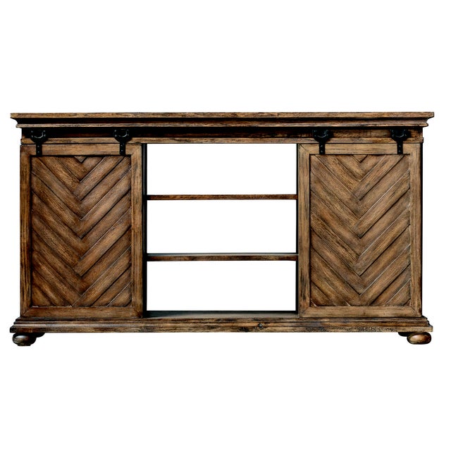 A craftsman built media piece finished in antique honey on Mango wood. Love the featured chevron patterned sliding doors....