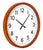 The Warren Wall Clock brings a calm, sun-warmed presence to any room with its wide honey wood frame and clean round 23.5"...