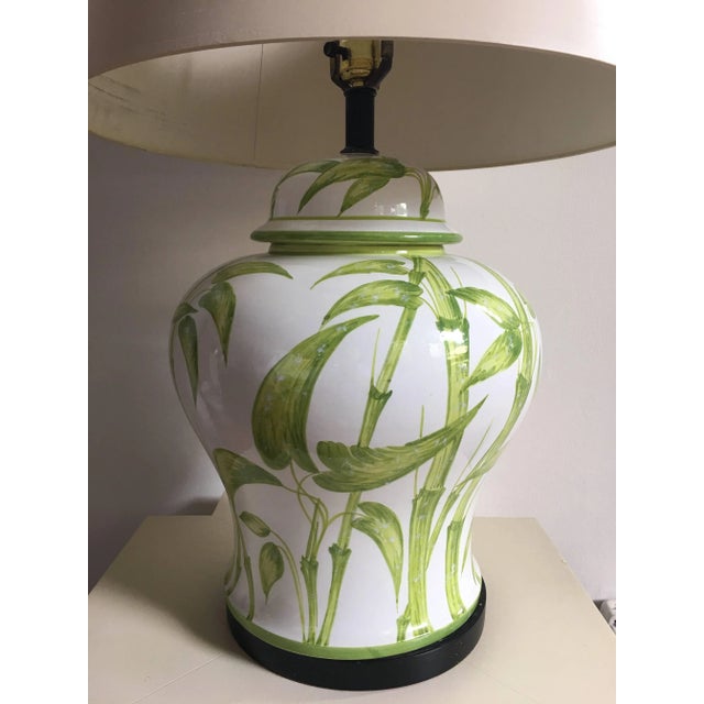 Mid-Century Modern Hollywood Regency style ceramic ginger jar table lamp with hand-painted bamboo leaf or botanical motif...