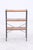 The vintage string shelf combines a delicate black metal frame with three warm-toned wooden shelves. The open design...
