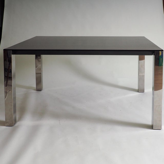 Striking Mid-Century Elegance: Saporiti Dining Table by Giovanni Offredi. The table exhibits a refined modernist...