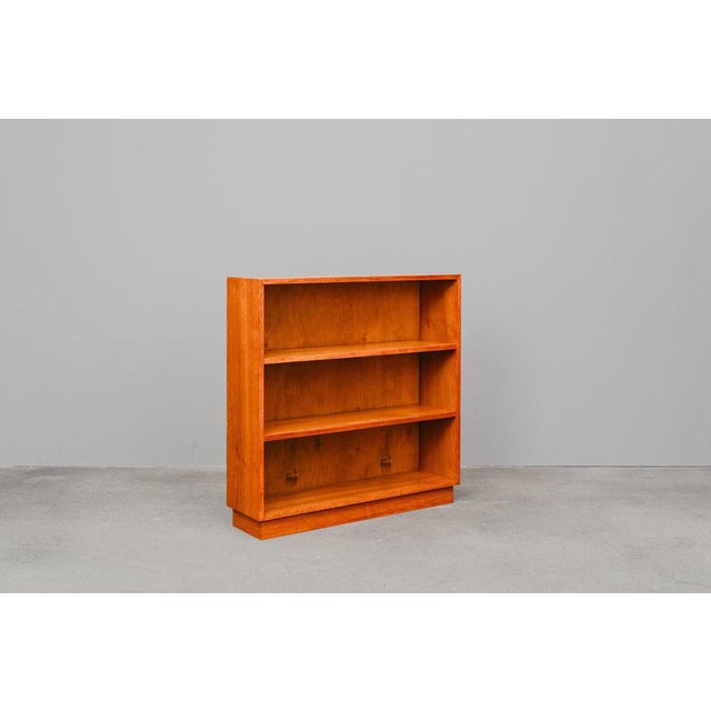 Item: Bookcase Period & Style: Mid-Century - Mid-20th Century Features: - Simple and timeless design with clean lines -...