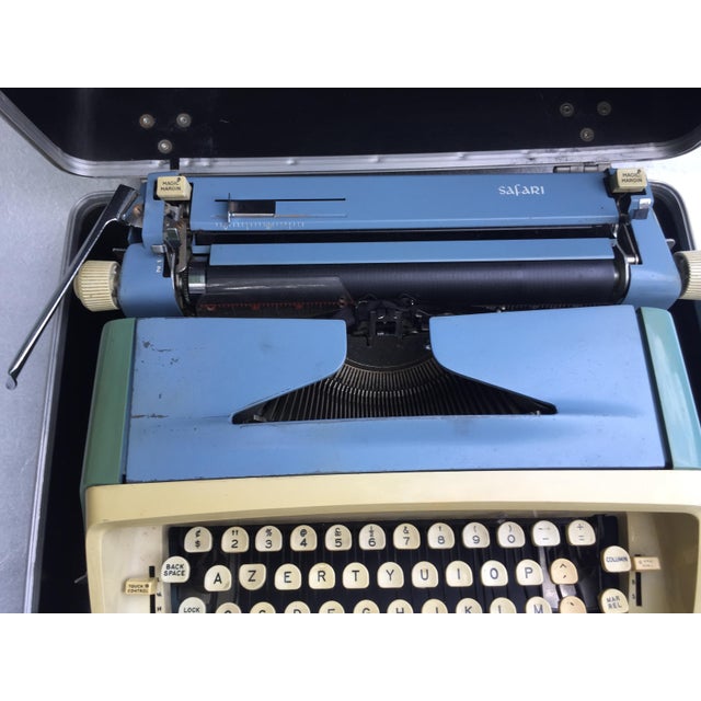 Vintage Safari Typewriter from Imperial, in Worn conditions. Designed 1970 to 1979 This piece has an attribution mark, I...