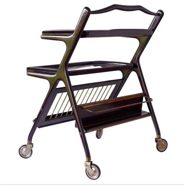 Bar Cart by Cesare Lacca Italy, 1950s Brass and rosewood. Removable trays and Bottle rack Excellent condition. Glass...