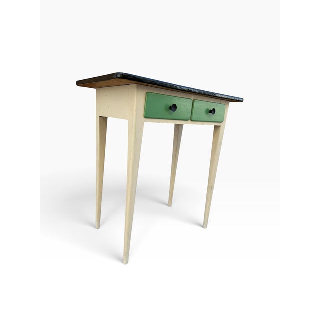 Beautiful fir table with a blue Formica top, 2 drawers painted green, black knob. French craftsmanship.
