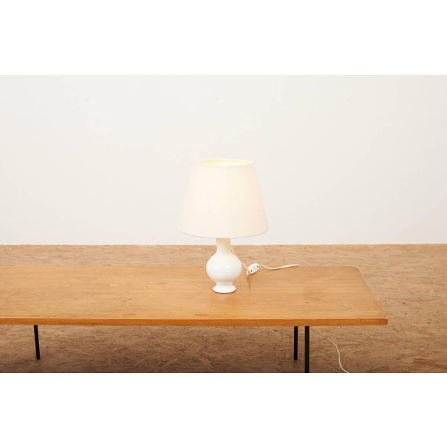 Table Lamp with White Ceramic Base, 1940s, in Good conditions. Designed 1920 to 1949 This piece has an attribution mark, I...
