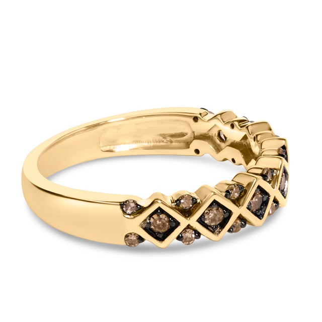 Wrap your finger in the opulent embrace of this exquisite band, masterfully crafted from .925 sterling silver and bathed...