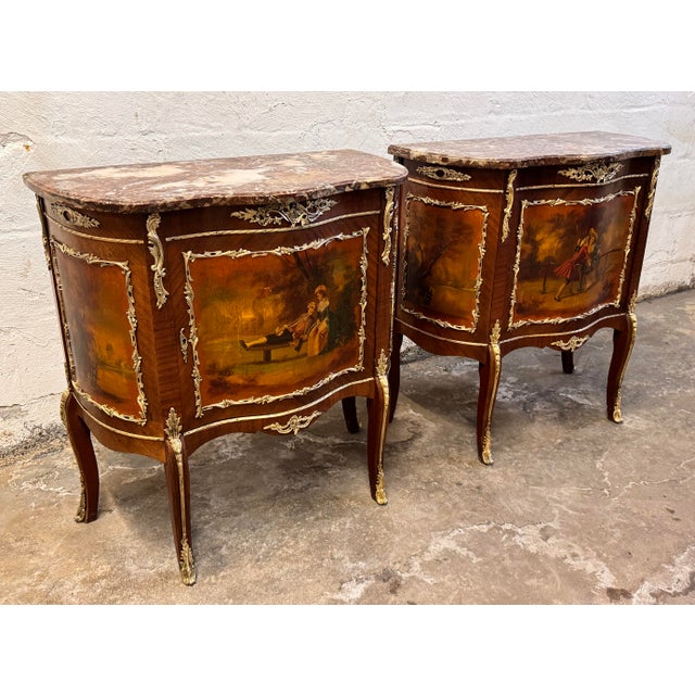 A pair of French Vernis Martin style commodes, pained scenes of Rococo courting couples on 3 sides, each commode having...