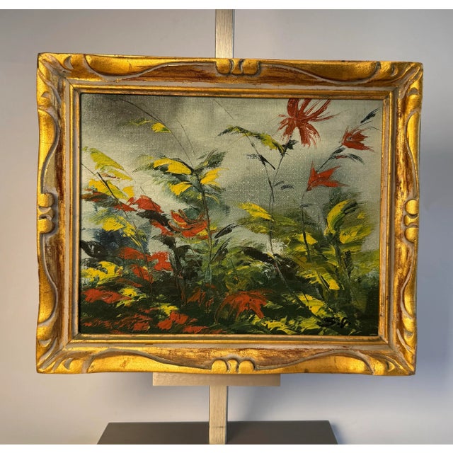 The intricate design and gleam of gold finish on this Baroque style frame highlights the beautiful original oil floral...
