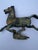 Bring a touch of ancient history and striking texture to your space with this vintage cast metal replica of the iconic...