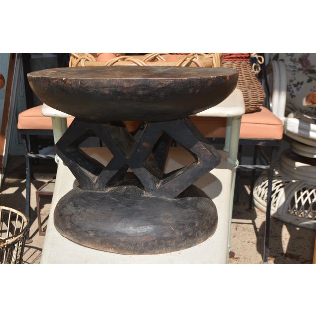 This wooden stool/work table came from Africa. Found in a container shipped here to the US in the 1980's. Looks to be hand...