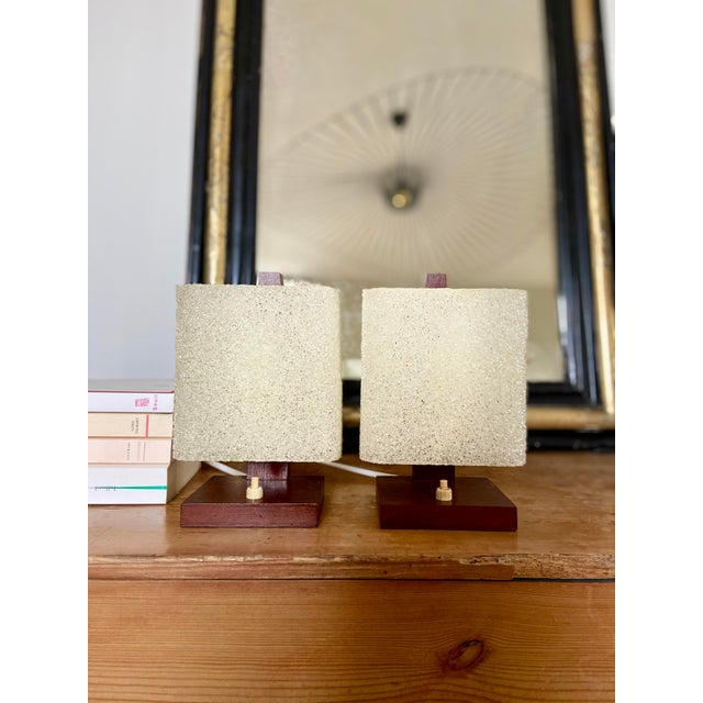 Wooden legs with switches. Cream-textured plastic shades. In excellent condition - electrical connection rewired. Height:...