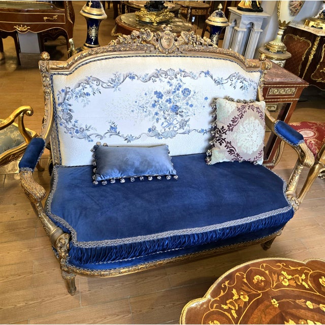 Elevate your interior with this elegant French Baroque-style settee sofa, featuring a beautifully carved frame with rich...