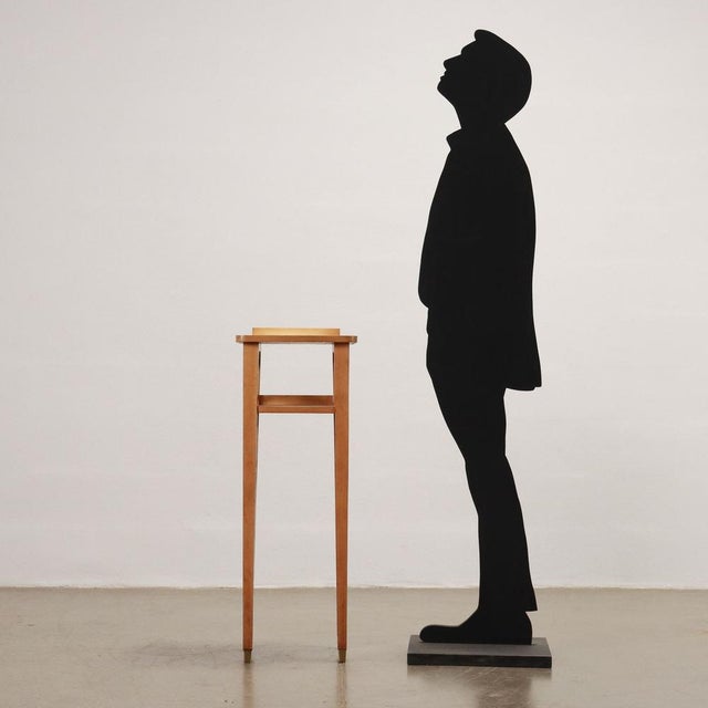 Vase holder in beech wood and oak veneer with brass tips; a particular piece of furniture with typical lines of the 50s, a...