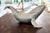 A pristine, rare and highly collectible Arthur Court whale-form champagne cooler, expertly cast in aluminum and designed...