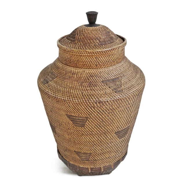 Vintage tall hand woven Suma basket with lid. Opening at top (without lid) is 11" diameter. Each basket will have slight...