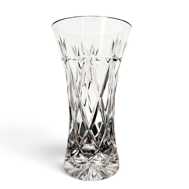 A late twentieth-century Edinburgh Crystal vase, produced in Scotland and acid etched “Edinburgh / Scotland”. The compact...