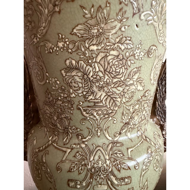 An exceptional vintage late 20-th century Chinese export pedestal urn by Hua Rong Tang Zhi. It features a finely glazed...