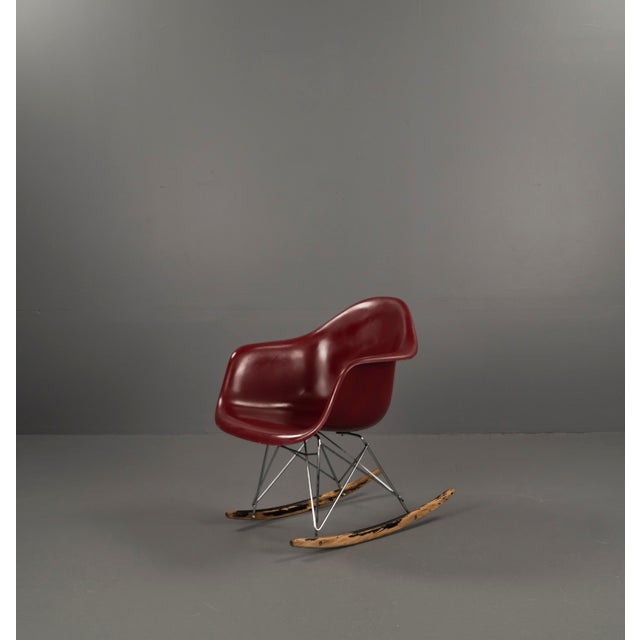 This iconic rocking chair by Ray Eames and Charles Eames exemplifies comfort, innovation, and timeless design. The...
