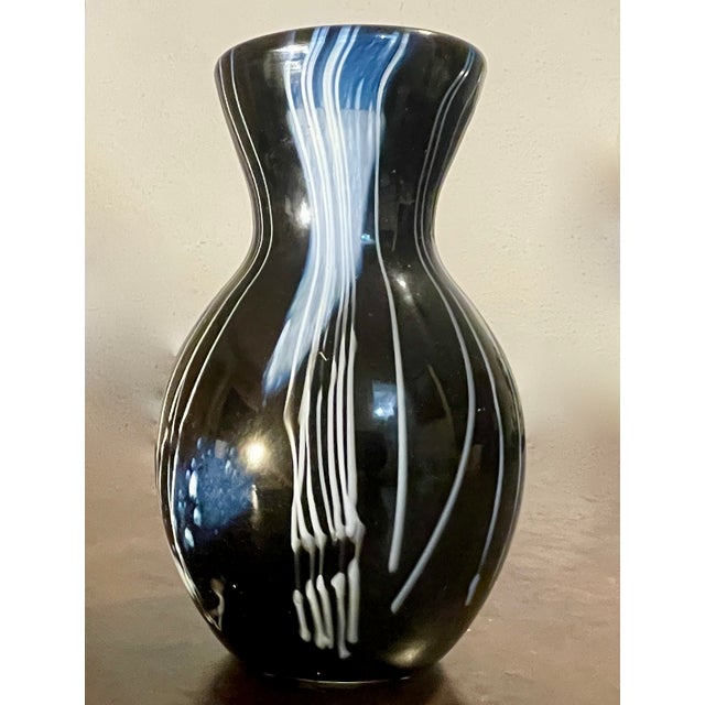 An exceptional piece of late mid-century studio art glass, handcrafted and signed by artist Foster in 1978. This striking...