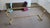 Vintage 1970s Design Institute of America Brass & Smoked Glass Coffee Table – Greek Key Design For Sale - Image 12 of 12