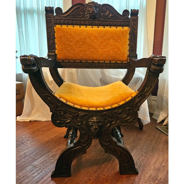 Make a regal statement with this imposing 19th-century Continental Renaissance style throne-form armchair. Masterfully...