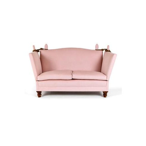 An outstanding Victorian Knole sofa upholstered in blush pink upholstery. The sofa has a high back and two drop down arms...