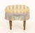 Louis XVI Style Upholstered Oval Ottoman, with tassel fringe border and fluted wood legs. 18" H x 19" W x 16" D....