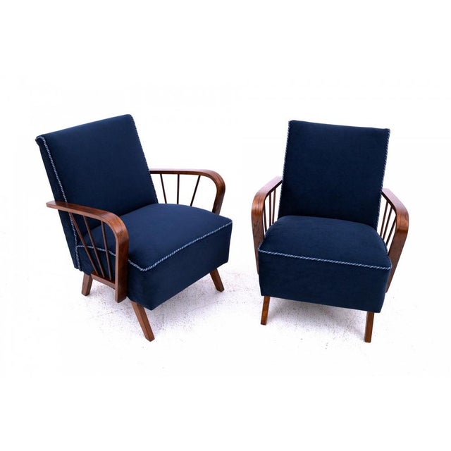 Vintage armchairs, Poland, 1960s. Very good condition, professionally restored and reupholstered. Wood: walnut Dimensions:...