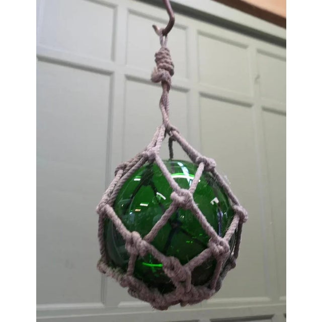 Large Vintage Hand Blown Glass Fishing Float A good Example, hand blown with a large pontil and hand knotted hemp rope...