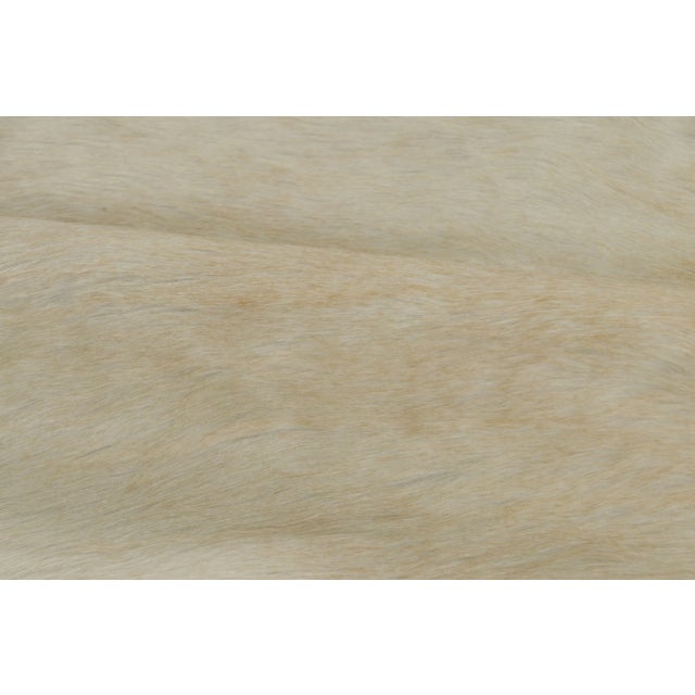 This 7x8 contemporary cowhide rug is an exciting new addition to Rug & Kilim’s Modern collection—a naturally shaped animal...