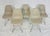 This set of five original molded shell chairs was designed by Charles Eames and Ray Eames and manufactured by Herman...