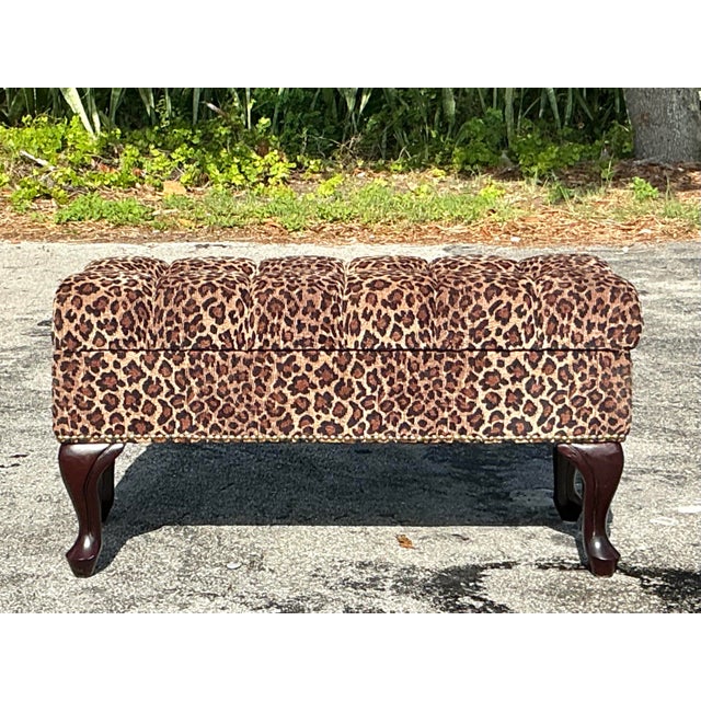 Make a bold statement with this glamorous Vintage Regency Tufted Leopard Ottoman Bench. Featuring richly tufted cushioning...
