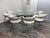 Design Plus Gallery presents a Contemporary Glass Dining Table + Set of Eight White Leatherette Dining Chairs by VIG...