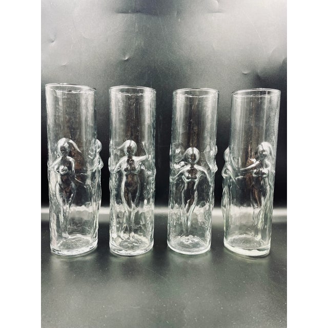 These rare and extremely tall glasses/tumblers feature a 3-D Dancing Lady pattern known as "La Femme." They were often...