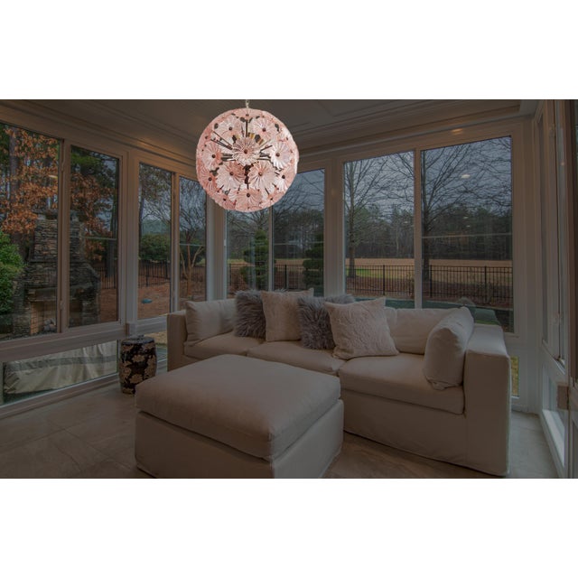 Sputnik space age Italian vintage crystal chandelier made by 51 pink glasses in a burnished brass metal frame. Elegant...