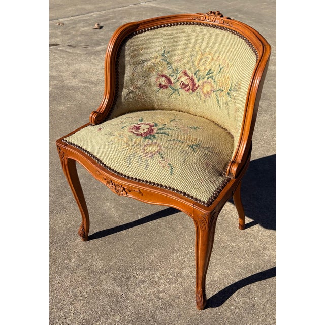 Love this vintage vanity chair with needlepoint upholstrey and gold velvet fabric on back and sides. Nice carving with...