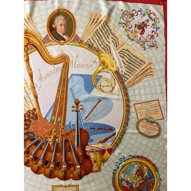 This scarf is a tribute to classical music and the genius composer Amadeus Mozart. It depicts a series of wind...