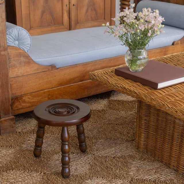 Lovely vintage stool with circular seat and bobbin tripod legs from France. Circular seat has beautiful carved ring detail...