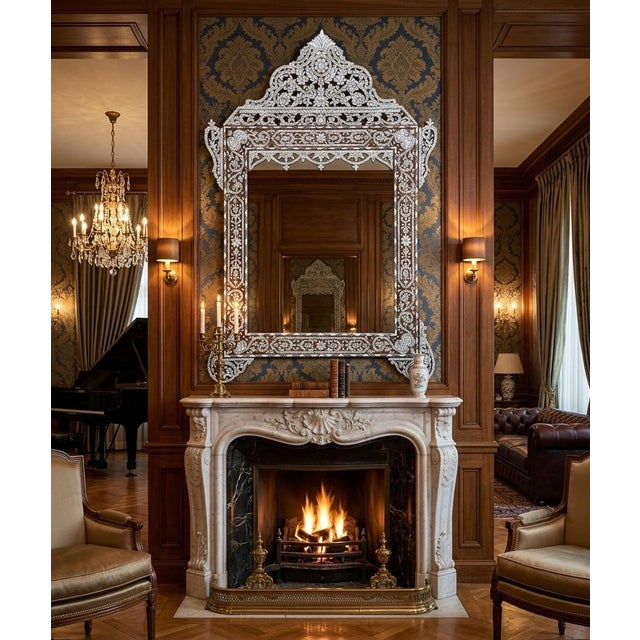 Sinuous lines, elaborate arabesques, and lustrous mother-of-pearl inlay define this exquisite handcrafted mirror....
