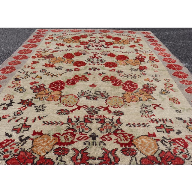 Vintage Turkish Oushak Rug in All-Over Flower Design Background & Simple Boteh Border For Sale - Image 4 of 13