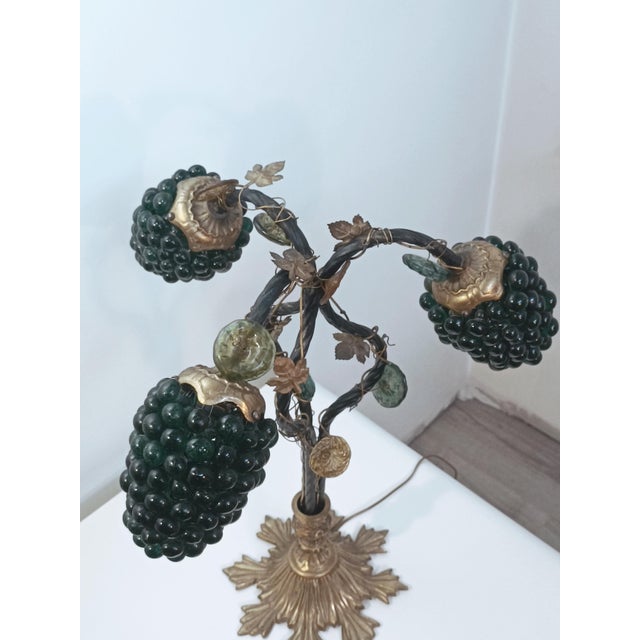 Magnificent sculptural Hollywood Regency lamp. Florence, Italy, 1960s. A sublime bronze base, subtly chiseled with highly...